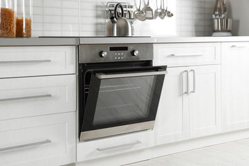 An oven being prepared to make DIY homemade rabbit treats.