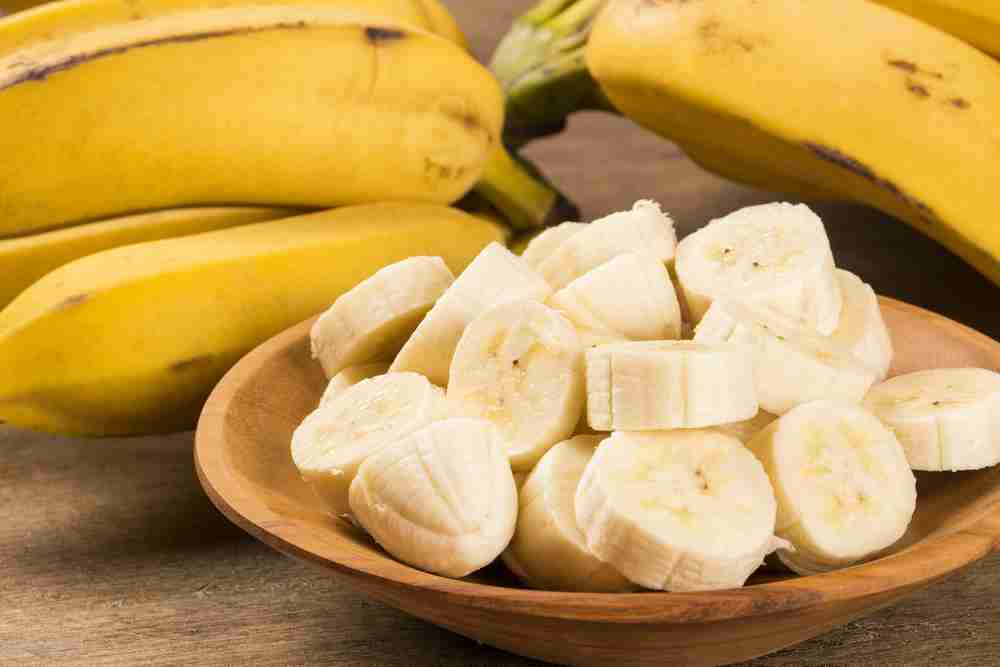 A bowl of cut bananas getting ready to be made into delicious rabbit treats.